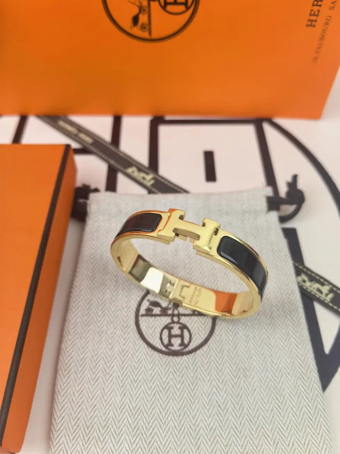 H - ARMBAND